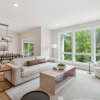 Pheasant Run Sadie Cottage Rambler Detached Villa – Great room windows with views to dining room and covered deck
