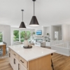 Pheasant Run Sadie Cottage Rambler Detached Villa – Kitchen Island views to great room and dining room