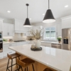 Pheasant Run Sadie Cottage Rambler Detached Villa – Kitchen with custom cabinets and laarge island