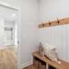 Pheasant Run Sadie Cottage Rambler Detached Villa – Mud room entry with bench and shiplap wall with hooks